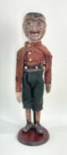 CARVED & PAINTED JIGGING FIGURE, wearing cotton shirt and woollen britches tied with leather belt,