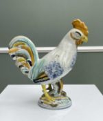 RARE PRATTWARE MODEL OF A COCKEREL, c. 1790-1810, brightly coloured and well modelled facing