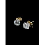 PAIR OF 14KT GOLD DIAMOND STUD EARRINGS, the two round brilliant cut stones measuring 2.0cts overall