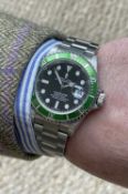 ROLEX SUBMARINER 'KERMIT' STAINLESS STEEL WRISTWATCH, ref. 16610LV, serial number D10****, circa