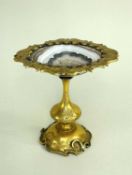 19TH CENTURY CONTINENTAL GILT BRONZE & AGATE TAZZA, the oval polished banded stone dish mounted with