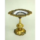 19TH CENTURY CONTINENTAL GILT BRONZE & AGATE TAZZA, the oval polished banded stone dish mounted with