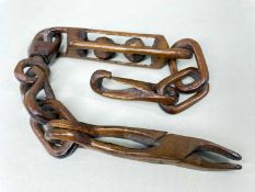 WELSH OR NORTH COUNTRY CARVED CHAIN LOVE TOKEN, with double ball caged link between hook and tongs