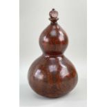 19TH CENTURY INCISED DOUBLE GOURD FLASK, with turned wood lip and stopper, decorated with