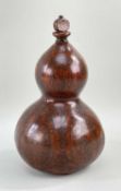 19TH CENTURY INCISED DOUBLE GOURD FLASK, with turned wood lip and stopper, decorated with