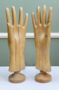 PAIR CARVED BEECH 'HAND' GLOVE STRETCHERS, with sliding sections on turned bases (2)Dimensions: