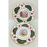 PAIR OF EMPIRE PORCELAIN CO. WALL PLAQUES, each with a central Neoclassical scene in the Vienna
