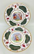 PAIR OF EMPIRE PORCELAIN CO. WALL PLAQUES, each with a central Neoclassical scene in the Vienna