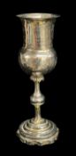 19TH CENTURY KIDDISH CUP, with foliate collar, swollen knop stem and stepped shaped foot, engraved