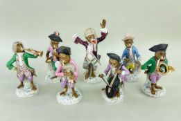 SEVEN 19TH CENTURY MEISSEN-STYLE PORCELAIN MONKEY MUSICIANS, comprising The Conductor, French