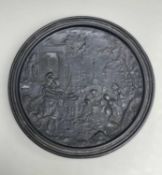 VICTORIAN LEAD ALLOY CIRCULAR WALL PLAQUE, depicting Grecian scene of musicians, lovers, putto and