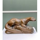RICHARD FISHER, bronzed resin - Otter on a rock, signed, 14 x 26cms
