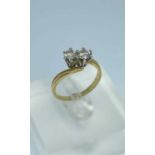 18CT GOLD TWO STONE DIAMOND RING, twist shank, 0.4cts overall approx., ring size L, 2.9gms, in