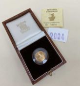 1987 BRITANNIA 1/10 OUNCE PROOF £10 COIN, 1987, in presentation box with Certificate of