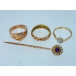 ASSORTED JEWELLERY comprising two yellow metal rings, 9ct gold cabochon opal ring, and a 15ct gold