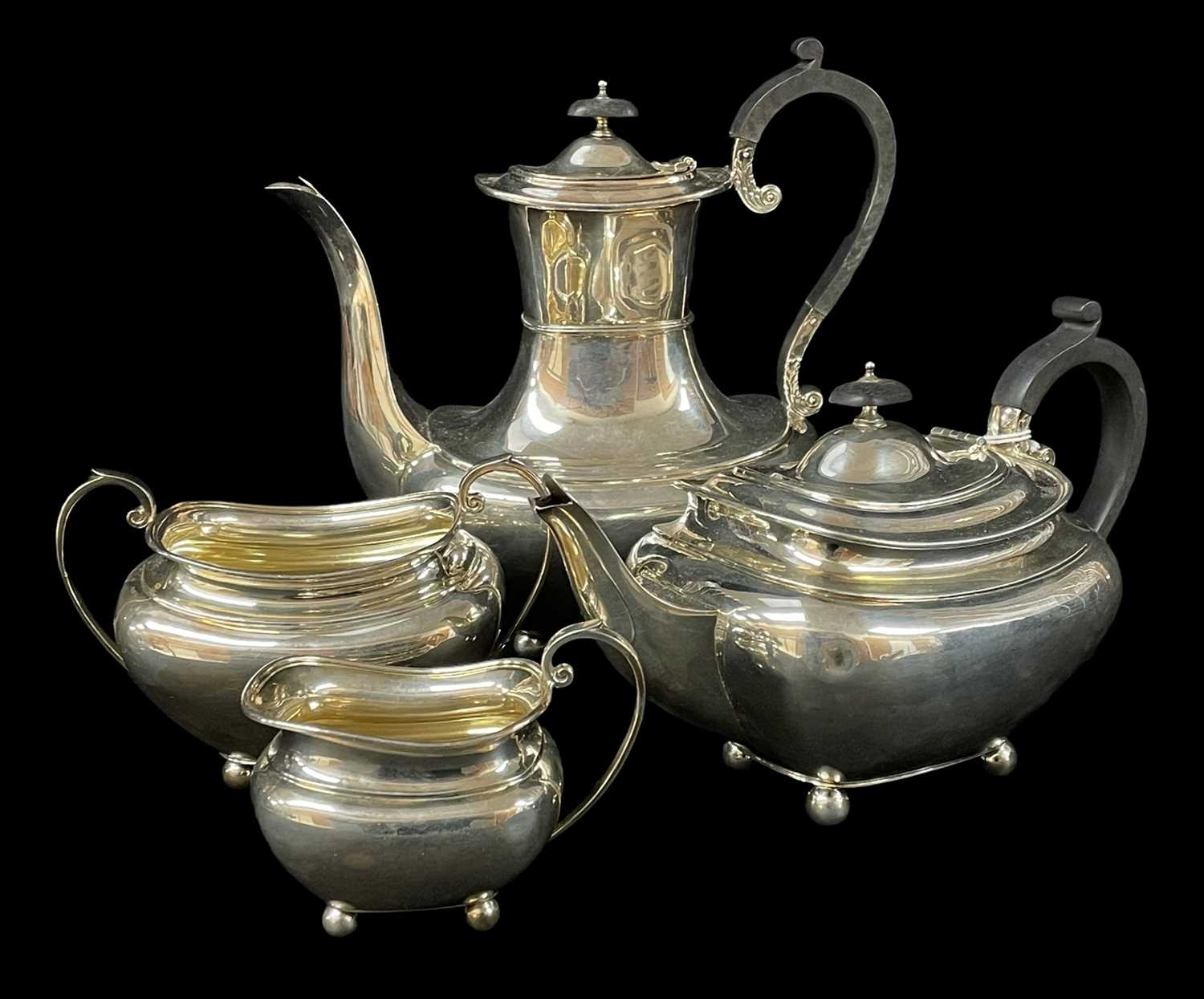GEORGE V SILVER FOUR-PIECE TEA & COFFEE SET comprising coffee pot, teapot, sucrier and cream jug,