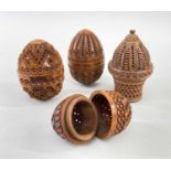 FOUR VARIOUS COQUILLA NUT POMANDERS, comprising one as a basket and three egg shaped, largest 7cm