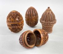 FOUR VARIOUS COQUILLA NUT POMANDERS, comprising one as a basket and three egg shaped, largest 7cm