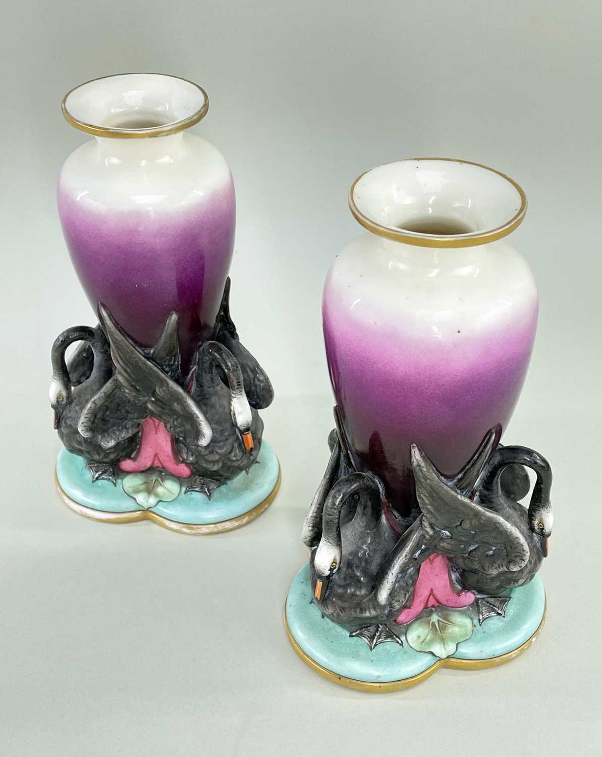 RARE PAIR OF WORCESTER PORCELAIN SWAN VASES, the graduated puce ovoid vessels supported by three - Image 2 of 2