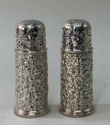 PAIR OF VICTORIAN SILVER SUGAR CASTERS, Horace Woodward & Co Ltd., 1890, with flowerhead and leaf