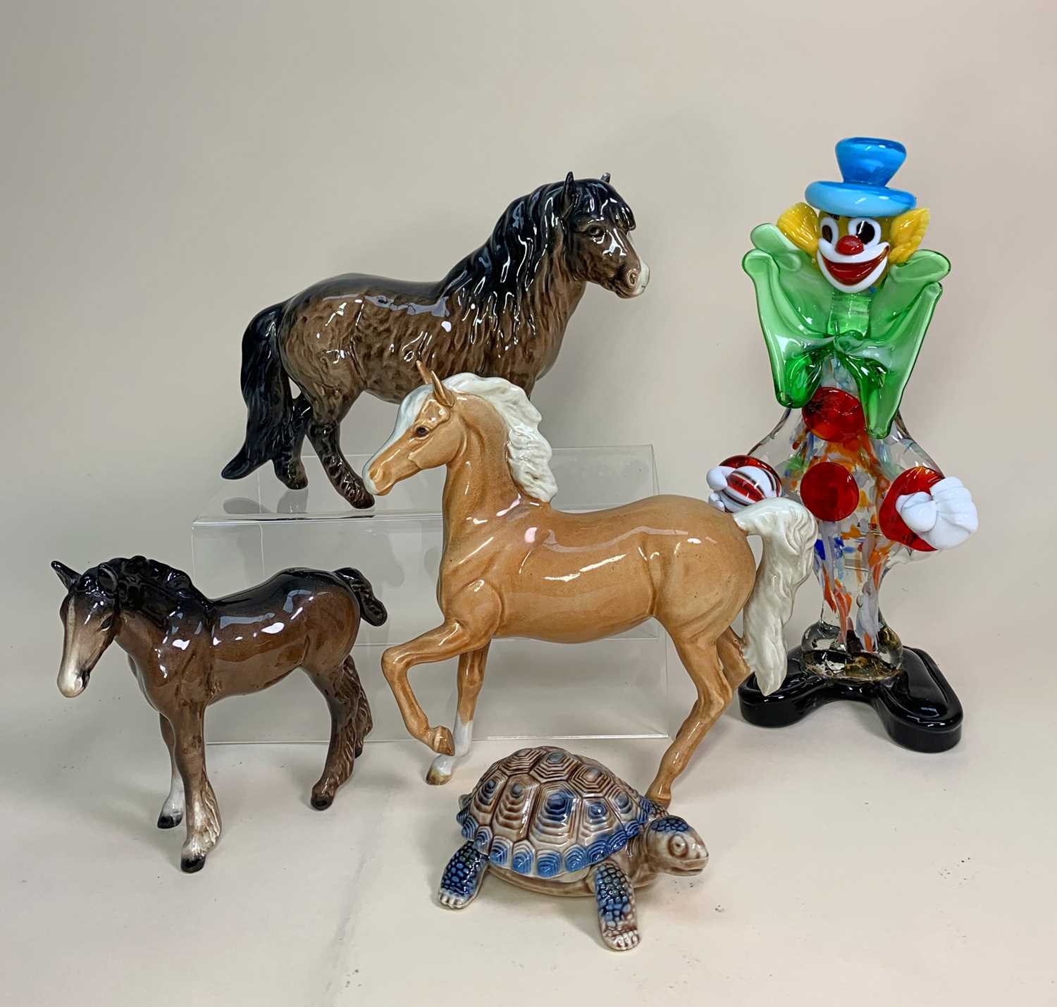 MID CENTURY CERAMIC & GLASS FIGURES including one Murano glass clown (minor loss to fingers and