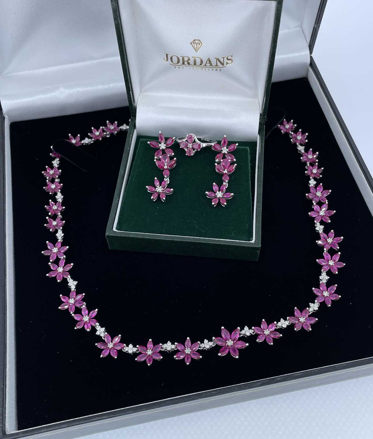 GOLD RUBY & DIAMOND JEWELLERY comprising 18K white gold ruby and diamond flower necklace, 43cms - Image 2 of 2