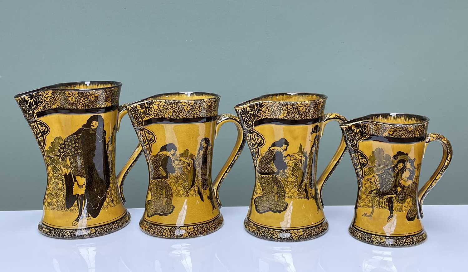 FOUR ROYAL DOULTON 'MORRISIAN' WARE JUGS, of graduating size, printed marks to bases, the tallest