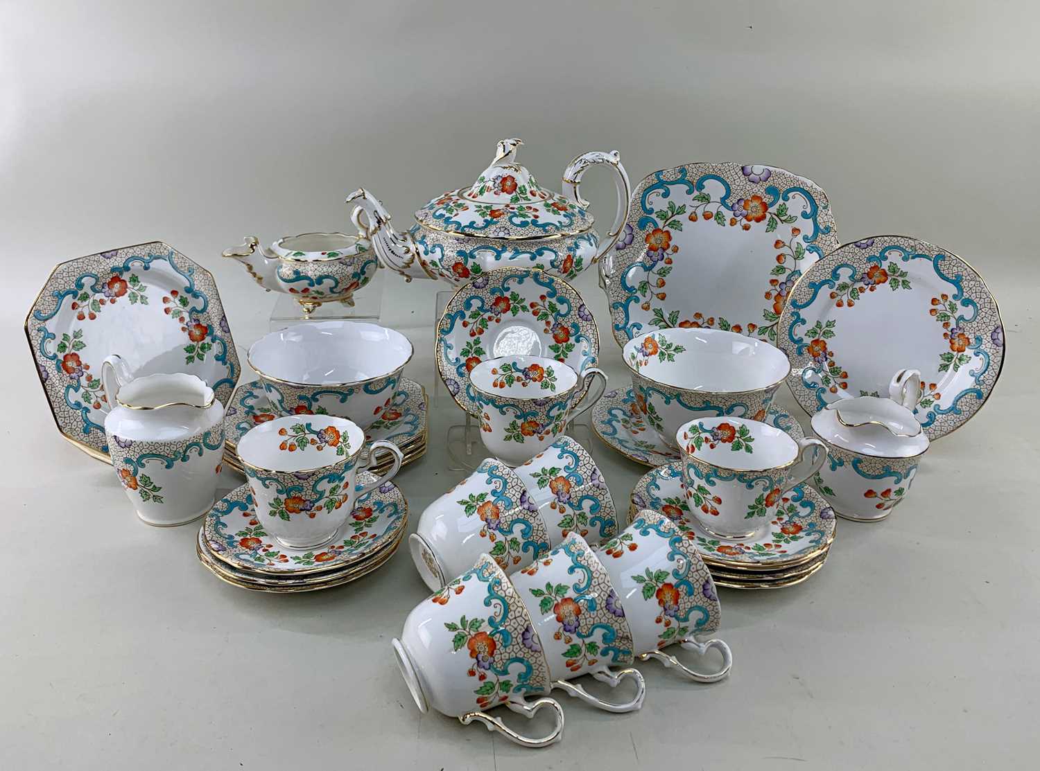 EARLY 20TH CENTURY ROYAL STAFFORD BONE CHINA TEA SERVICE, pattern no. 732562, decorated with red and