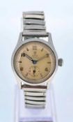 VINTAGE TUDOR OYSTER STAINLESS STEEL WRISTWATCH, probably ref. 4540, champagne dial with arabic