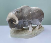 RARE ROYAL COPENHAGEN MODEL OF A MUSK OX, standing on naturalistic base, impressed number '530' to