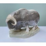RARE ROYAL COPENHAGEN MODEL OF A MUSK OX, standing on naturalistic base, impressed number '530' to