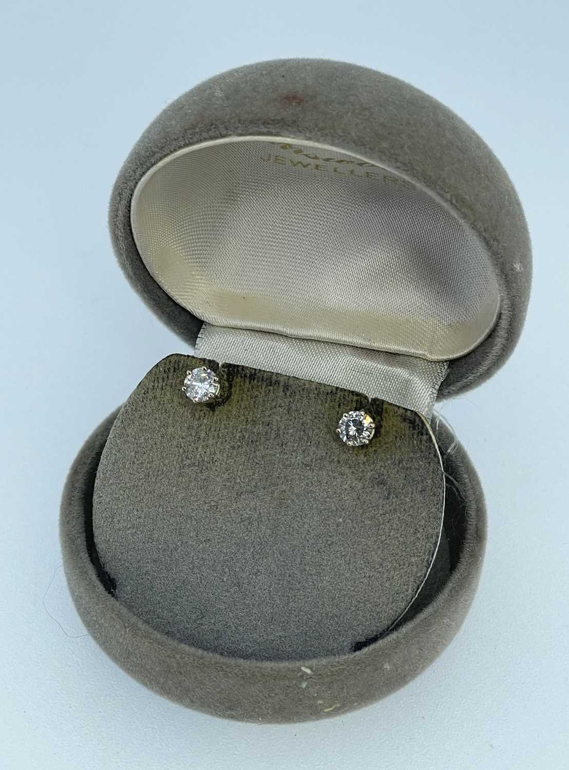 PAIR SOLITAIRE DIAMOND EARSTUDS, modern brilliant cut in 14ct gold claw and post mounts, tot diamond