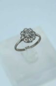 PLATINUM & 18CT WHITE GOLD NINE STONE DIAMOND CLUSTER RING, totalling 0.5cts overall approx., ring