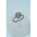 PLATINUM & 18CT WHITE GOLD NINE STONE DIAMOND CLUSTER RING, totalling 0.5cts overall approx., ring