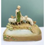 ROYAL DUX PORCELAIN FIGURE OF A SHEPHERDESS WITH SHEEP, maker's mark to base, 30h x 36cms