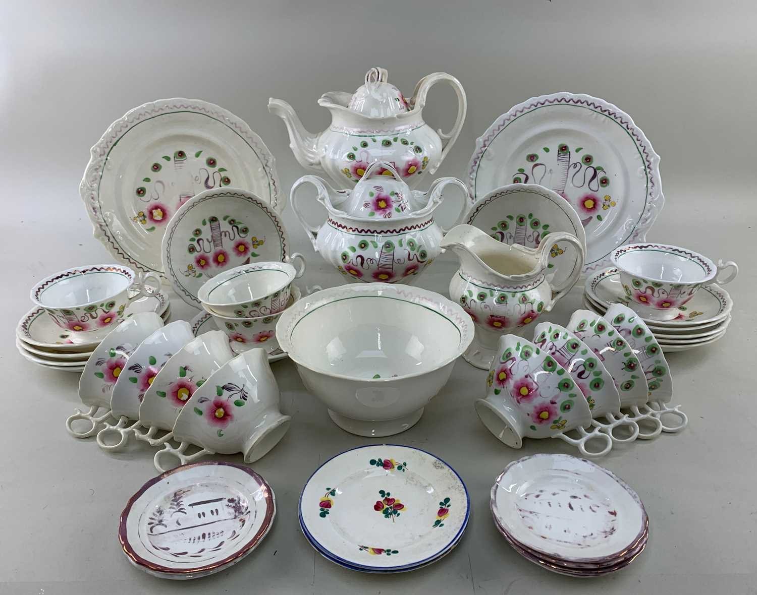 STAFFORDSHIRE 'GAUDY WELSH' TEA SERVICE FOR TWELVE, decorated with pink flowers and trellis,