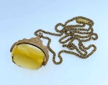 9CT GOLD CITRINE REVOLVING FOB on 9ct gold chain, 14.9gms Provenance: private collection Cardiff,