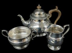GEORGE V SILVER TEA SET, Adie Bros, Birmingham 1922, comprising reeded bombe teapot, sugar bowl
