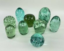 NINE VICTORIAN & LATER GREEN GLASS 'DUMP' PAPERWEIGHTS, of various size and designs including