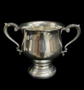 GEORGE V SILVER TROPHY CUP, Chester 1931, scrolled acanthus handles, broad socle foot, 23cm wide,