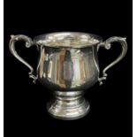 GEORGE V SILVER TROPHY CUP, Chester 1931, scrolled acanthus handles, broad socle foot, 23cm wide,