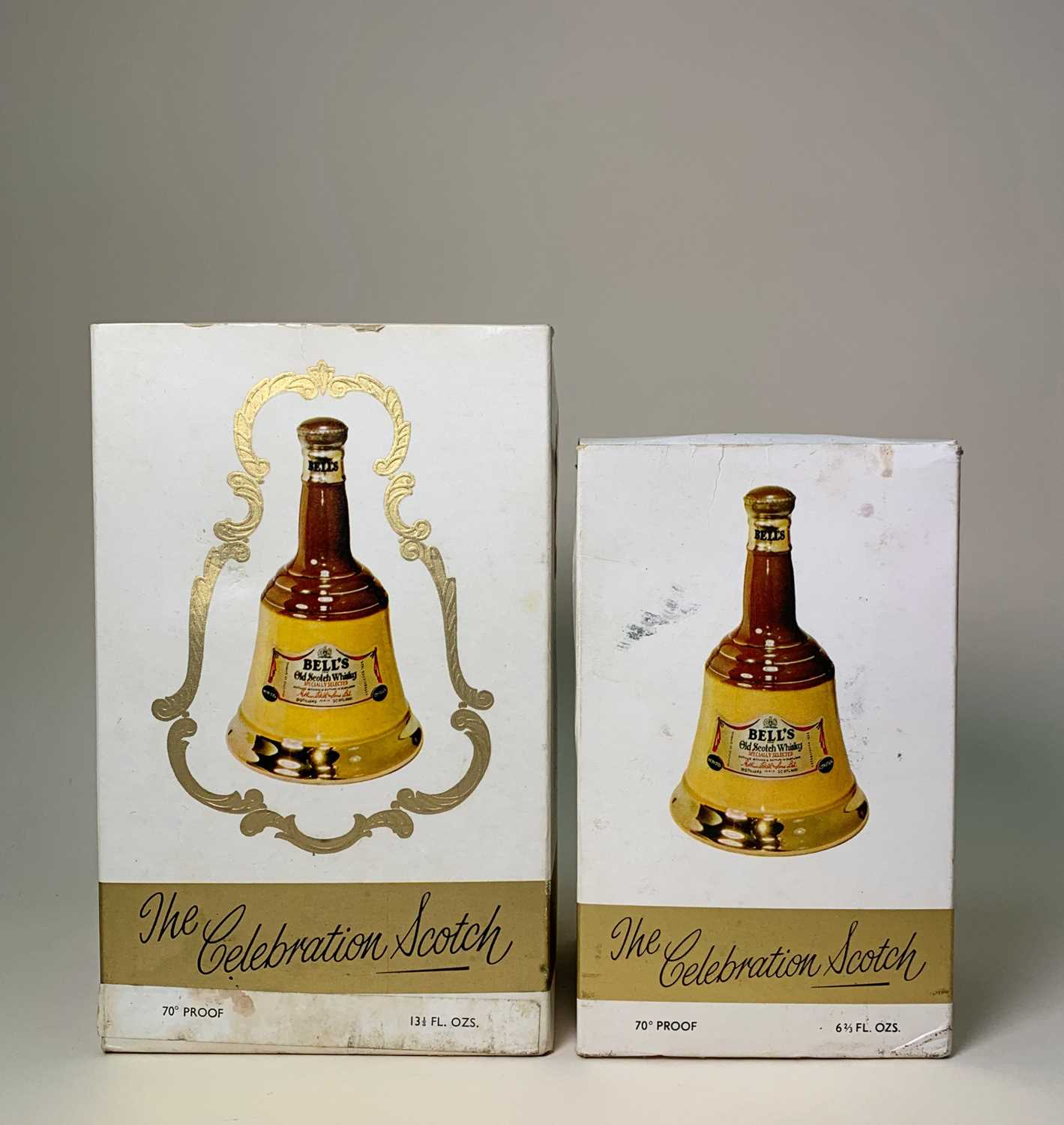 TWO RARE 1970'S WADE BELL'S WHISKY DECANTERS, one 6 2/3rds fl.ozs, one 13 1/3rd fl.ozs, both 70˚