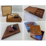 FOUR WOOD GAMES, comprising Italian 'Legnomagia' specimen wood puzzle, and a cube construction