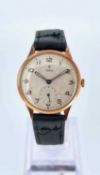 9CT GOLD TUDOR GENTLEMANS WRISTWATCH, c. 1957, 15J manual wind movement, champagne dial with applied