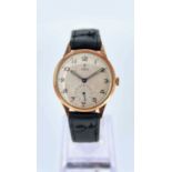 9CT GOLD TUDOR GENTLEMANS WRISTWATCH, c. 1957, 15J manual wind movement, champagne dial with applied