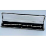 9K GOLD DIAMOND RUB-OVER BRACELET, of alternating bar and collet design, 20cms long, 13.8gms, in