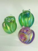 THREE JOHN DITCHFIELD FOR GLASFORM FROG PAPERWEIGHTS, the three iridescent glass seated frogs of