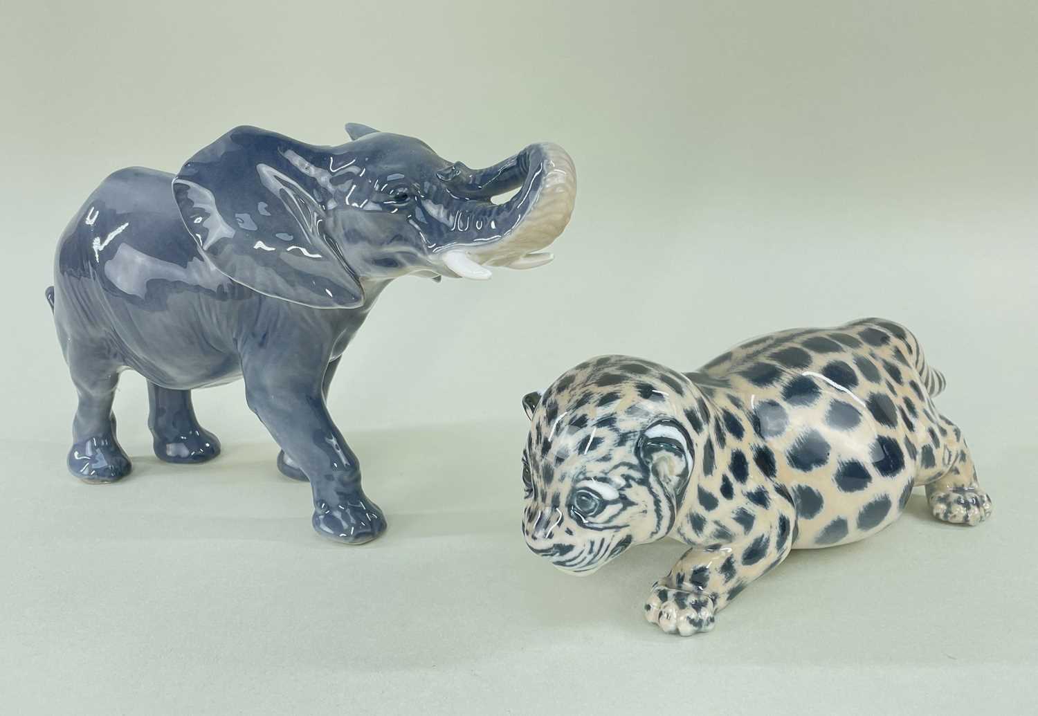 TWO ROYAL COPENHAGEN MODELS OF AFRICAN ANIMALS, comprising a leopard cub, model number '4659' with