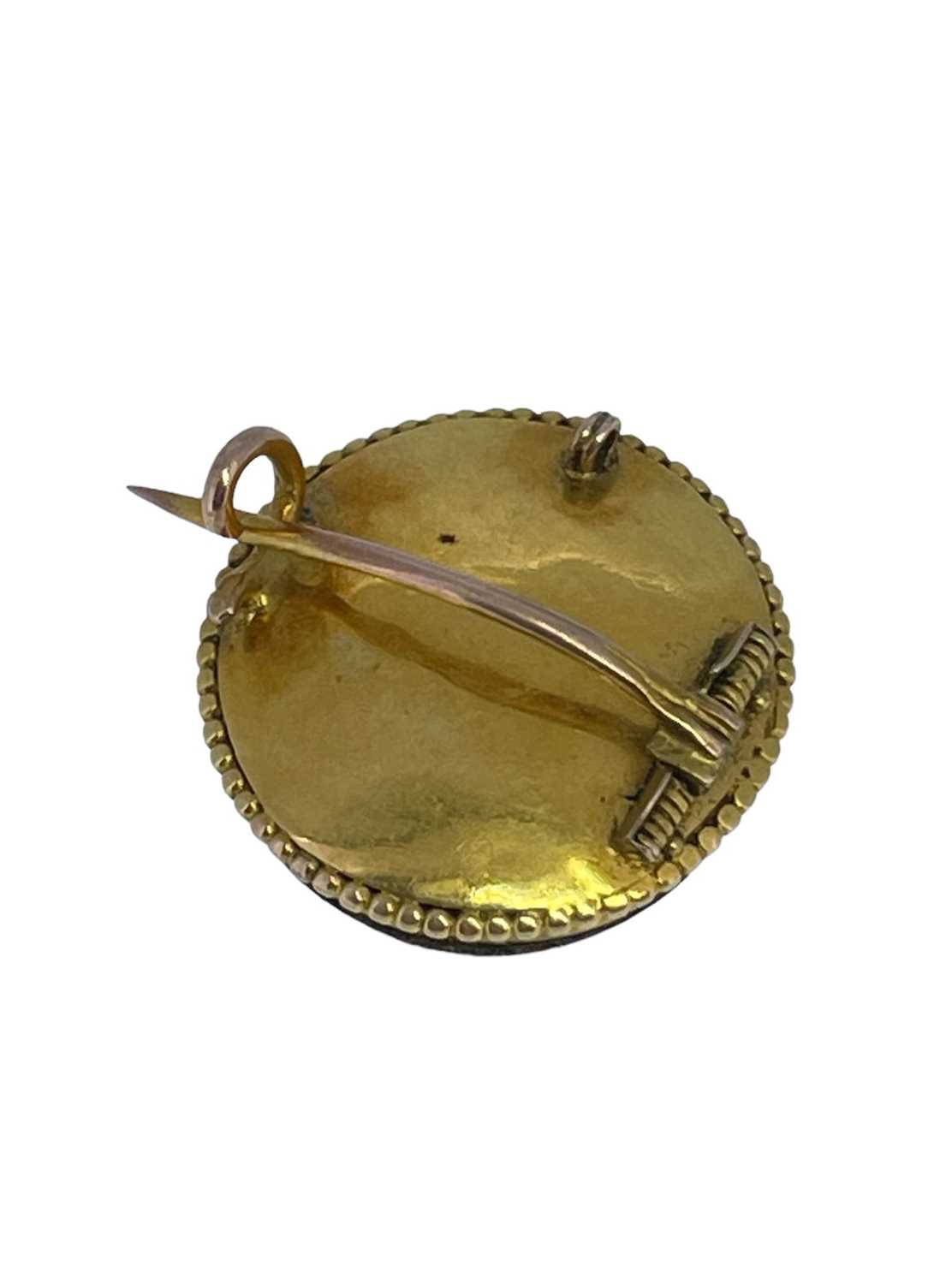 YELLOW METAL HORSE RACING BROOCH, of circular form depicting jockey on horseback Provenance: private - Image 2 of 2