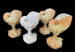 FOUR ROYAL WORCESTER NAUTILUS SHELL VASES, all on coral and shell supports, numbered '101',